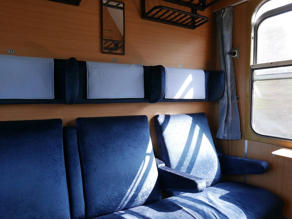 Interior of a Bulgarian State Railways second-class carriage, the typical setting for a medium-distance BDZ journey